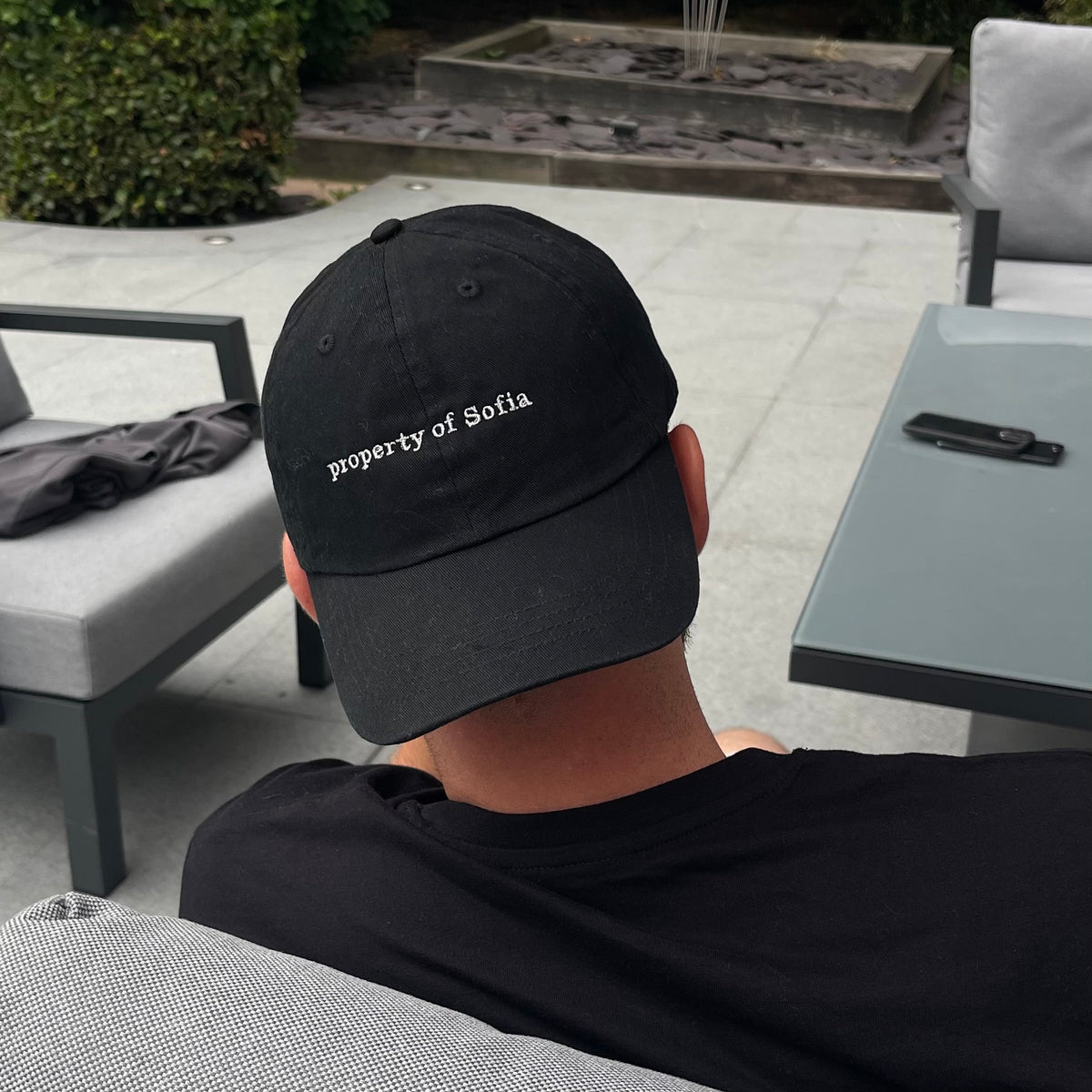 Property of personalised slogan unisex cap