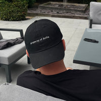 Property of personalised slogan unisex cap