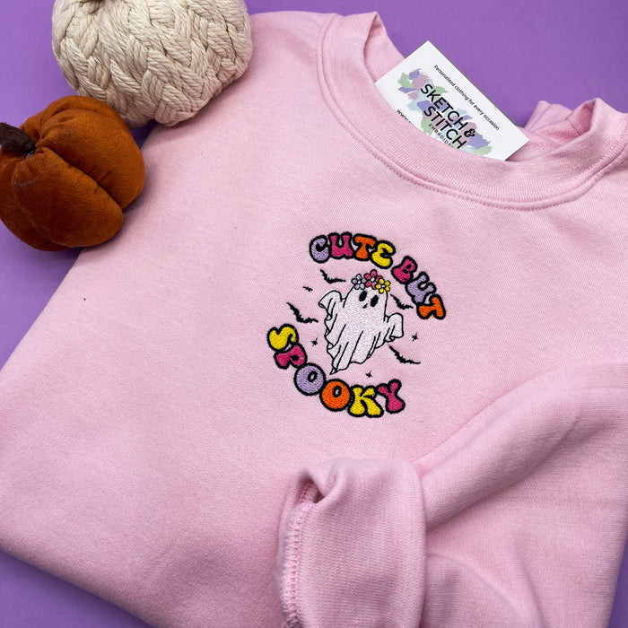 Adult sweatshirt cute but spooky slogan