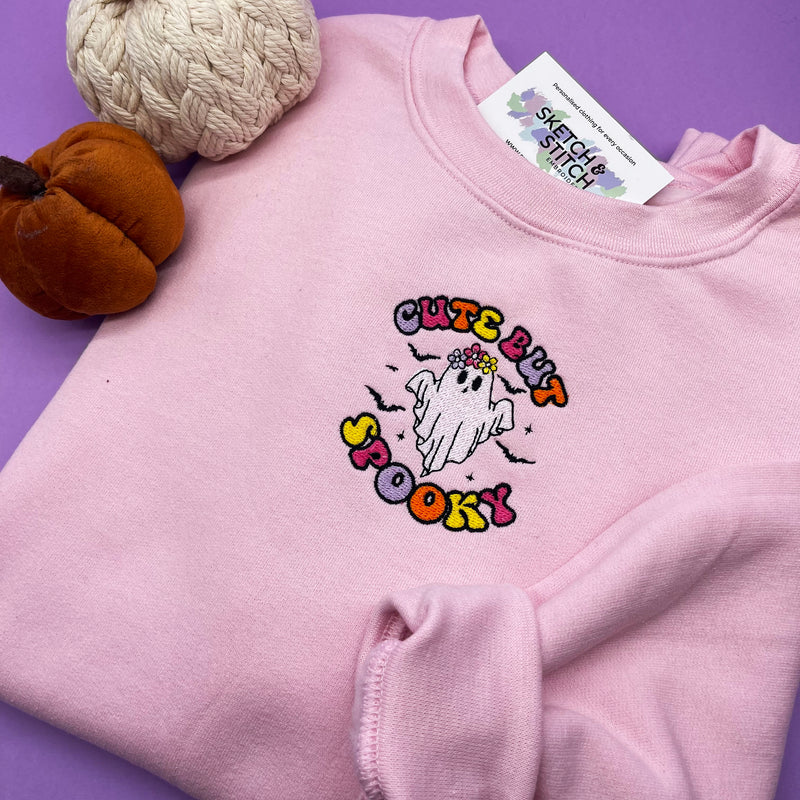 Adult sweatshirt cute but spooky slogan