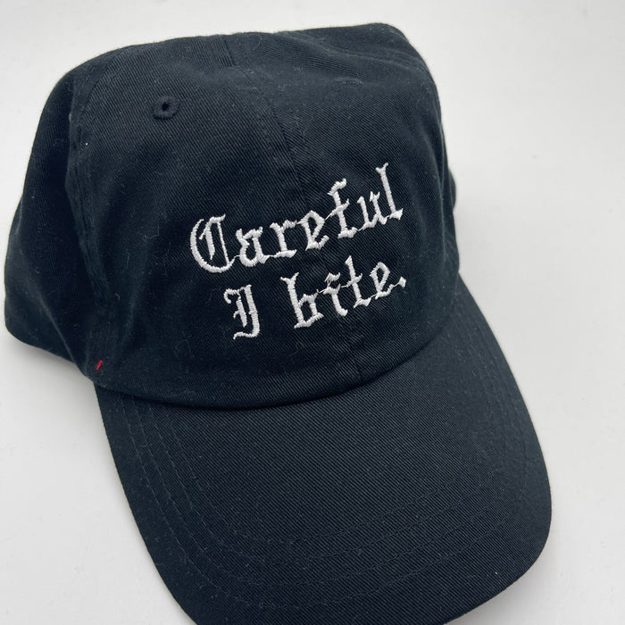 Cap sample I bite slogan