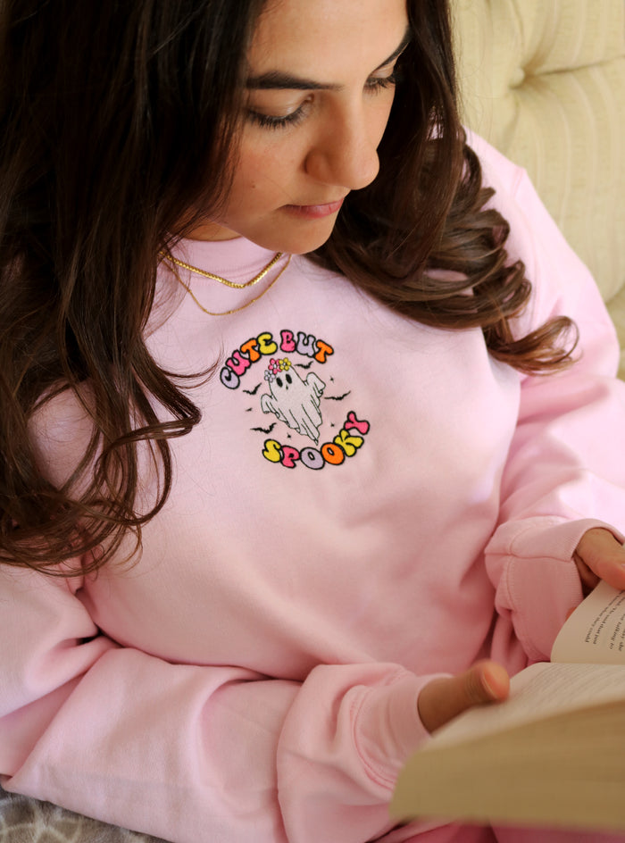 Adult sweatshirt cute but spooky slogan