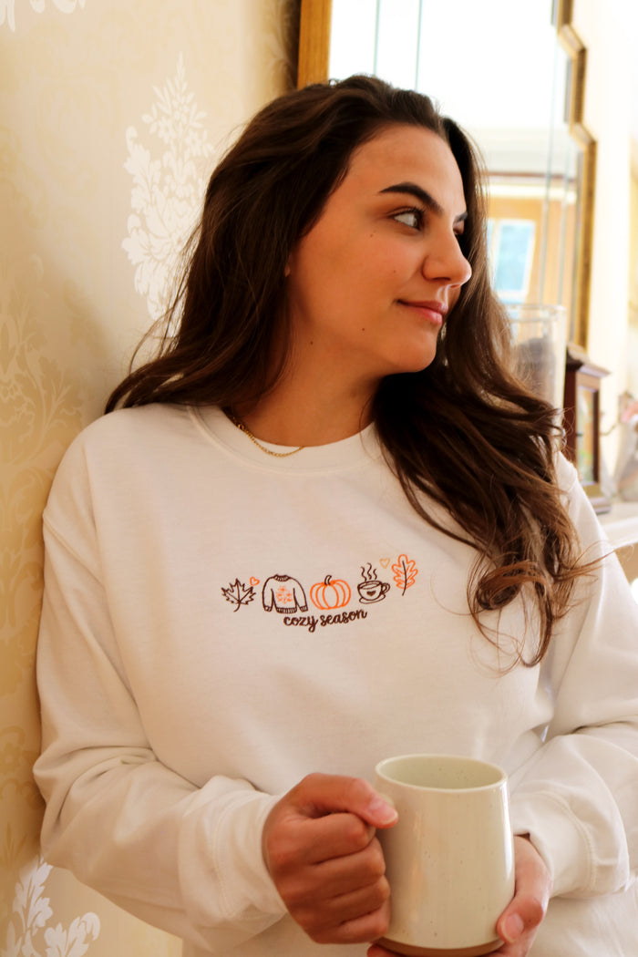 Adult sweatshirt cozy season slogan