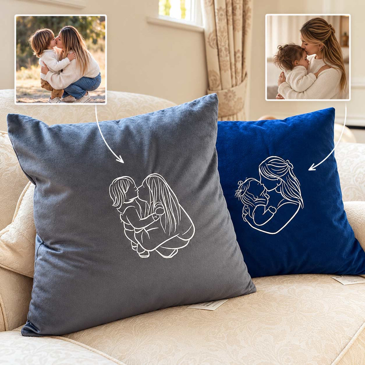 Two custom square throw pillows on a beige sofa, one in dark gray and one in royal blue, both printed with a white line drawing of a mother and child. Two small inset photos at the top show the source photo used for the custom print.